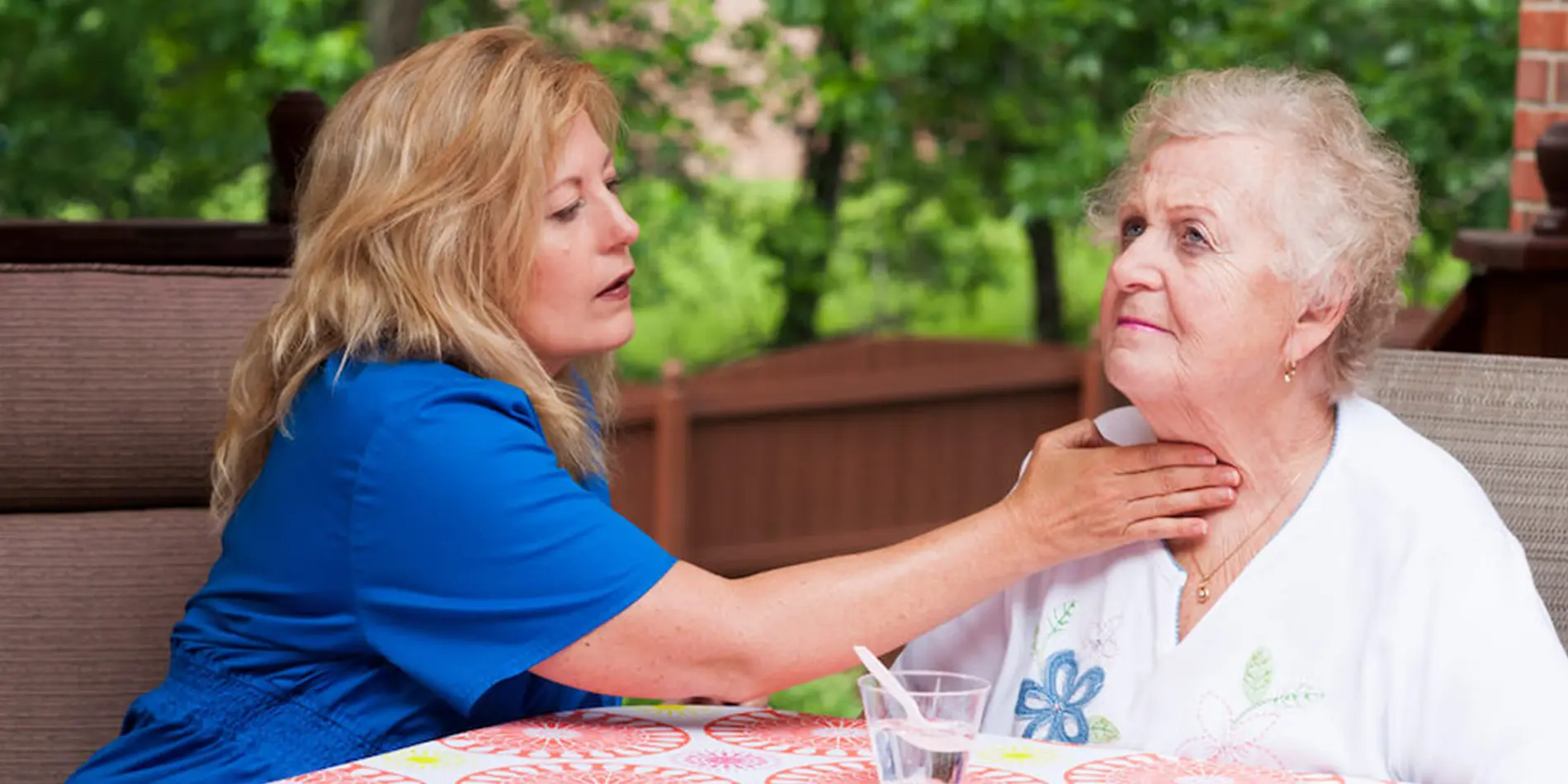 Speech language pathologist working with patient on communication skills